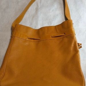 Camel color leather Longchamp purse.